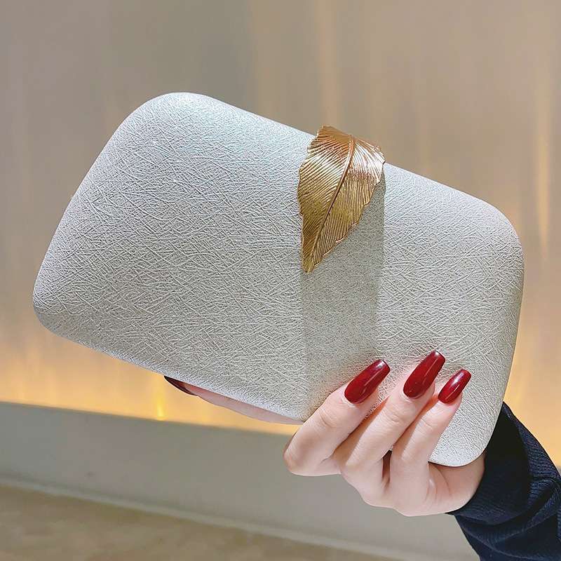 Elegant Textured Metal Leaf Chain Clutch